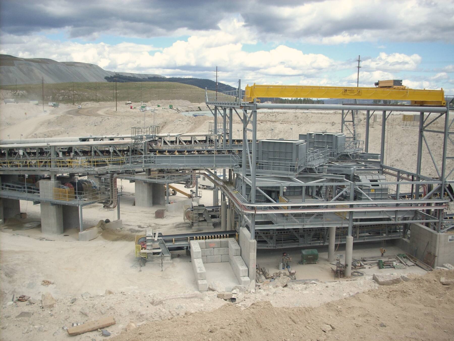 Conveyor transfer tower being built in an open pit mine