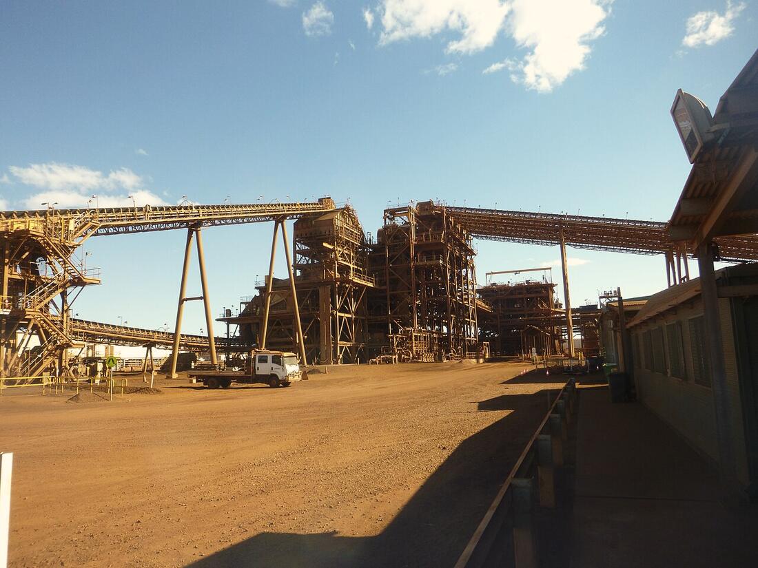 Conveyors and processing plant at Nammuldi iron ore mine in the Pilbara